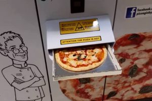 Sydney shop gives out pizza to people lining up for Covid tests