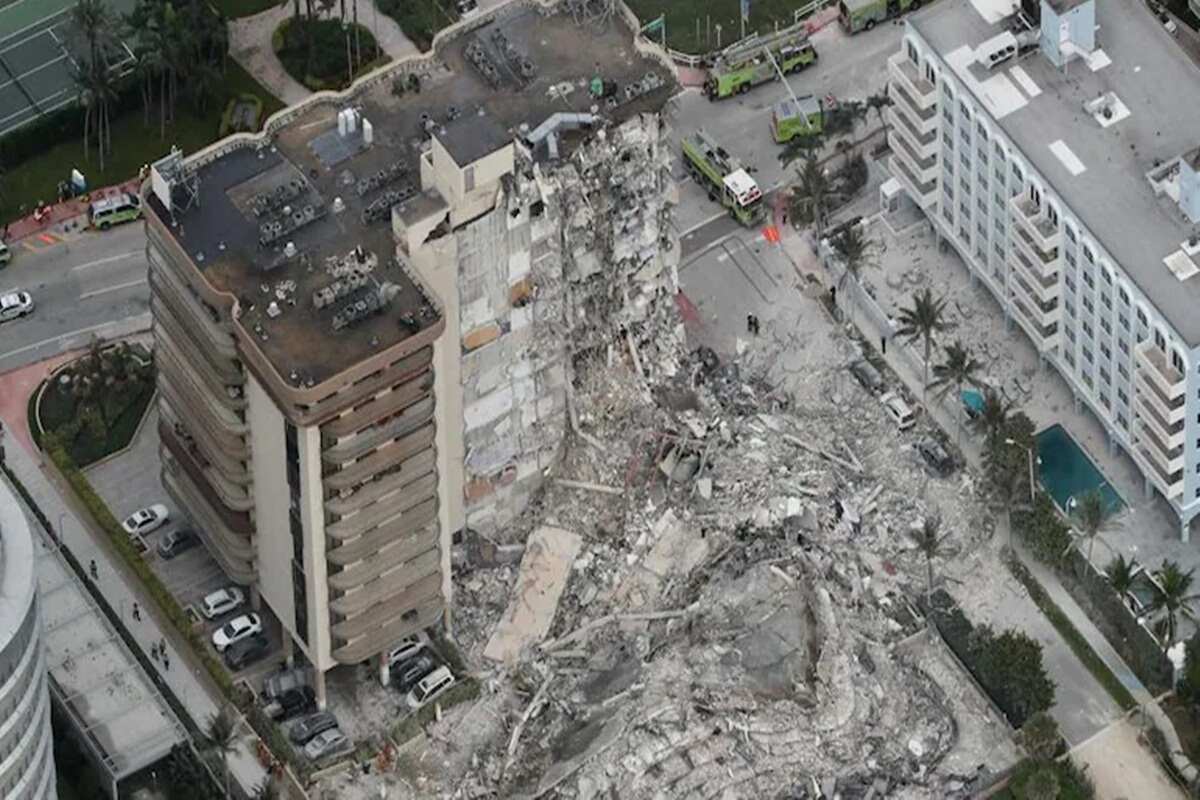 Miami building collapse: Rescuers look for signs of life in rubble