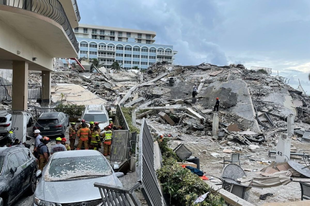 Condo building collapse death toll rises to nine