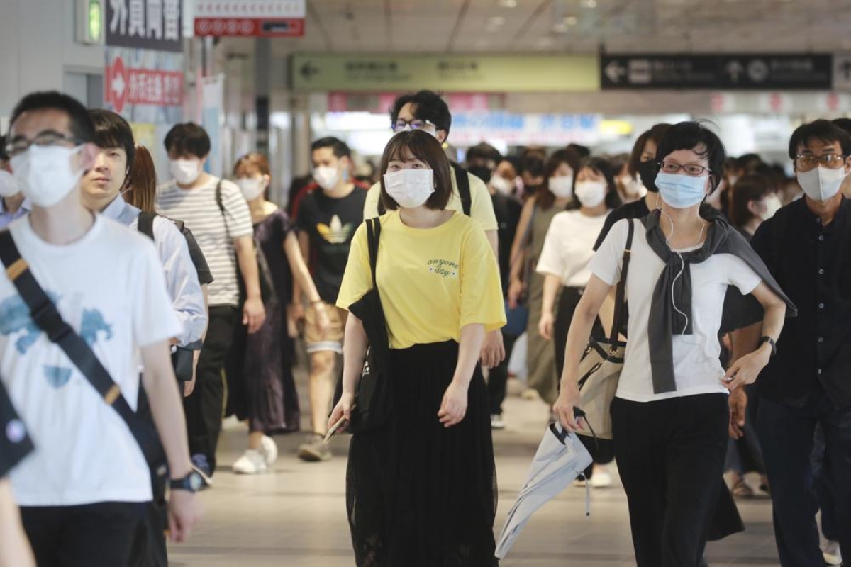 Get jabs to slow surge: Tokyo governor urges youth