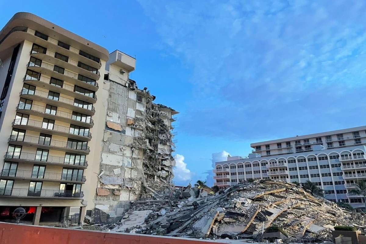 Demolition expedites search at condo site as storms threaten