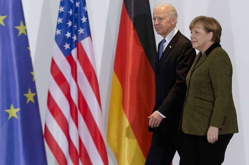 Neck rubs, tapped phones: Merkel has history with US leaders