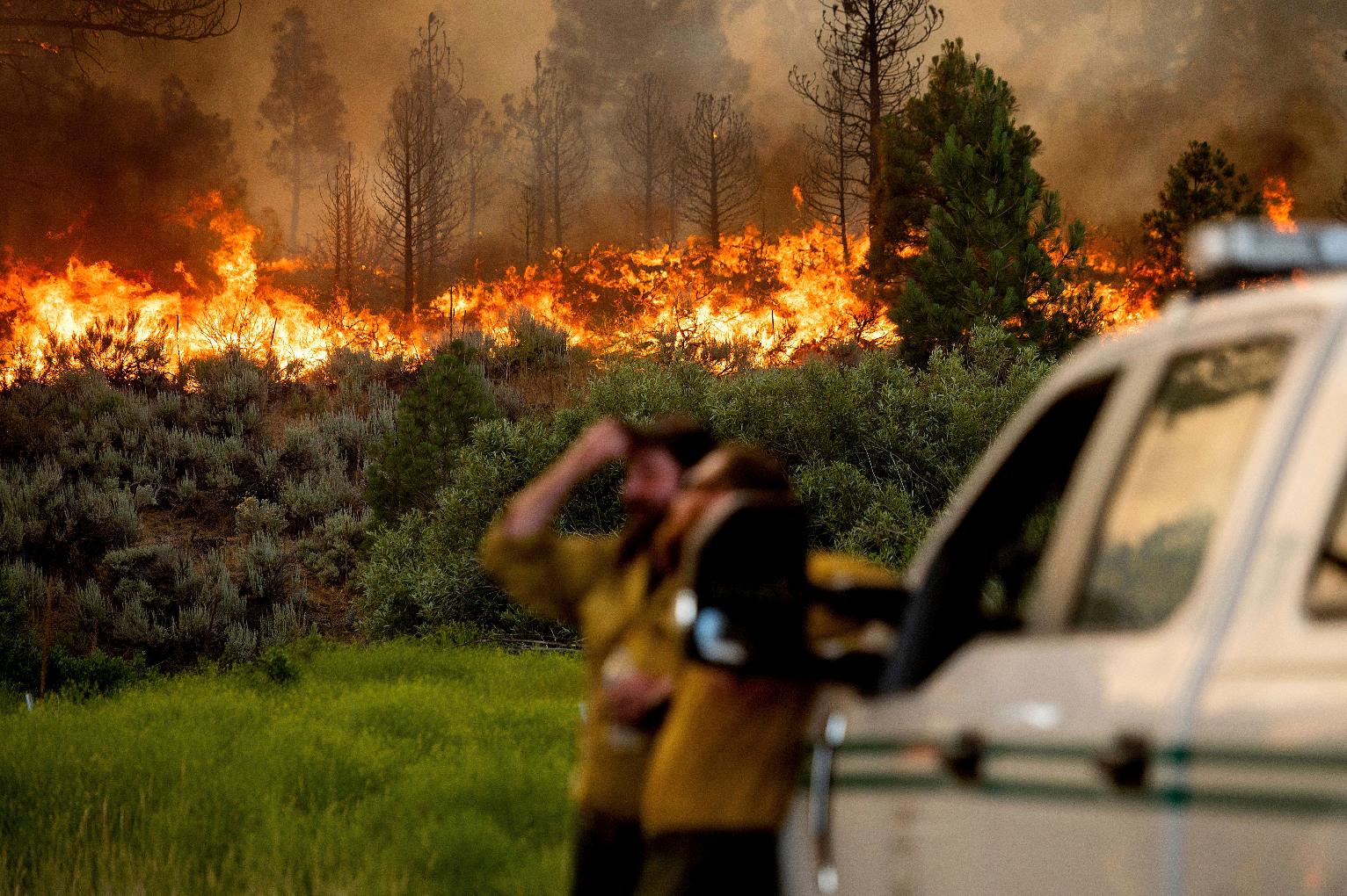 Heat wave blankets US West as wildfires rage in several states