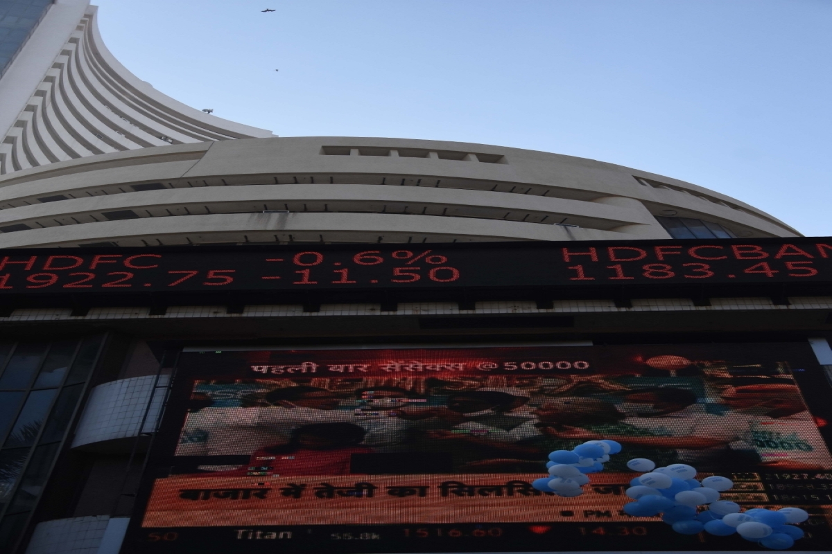 Sensex gives up gains after touching new high