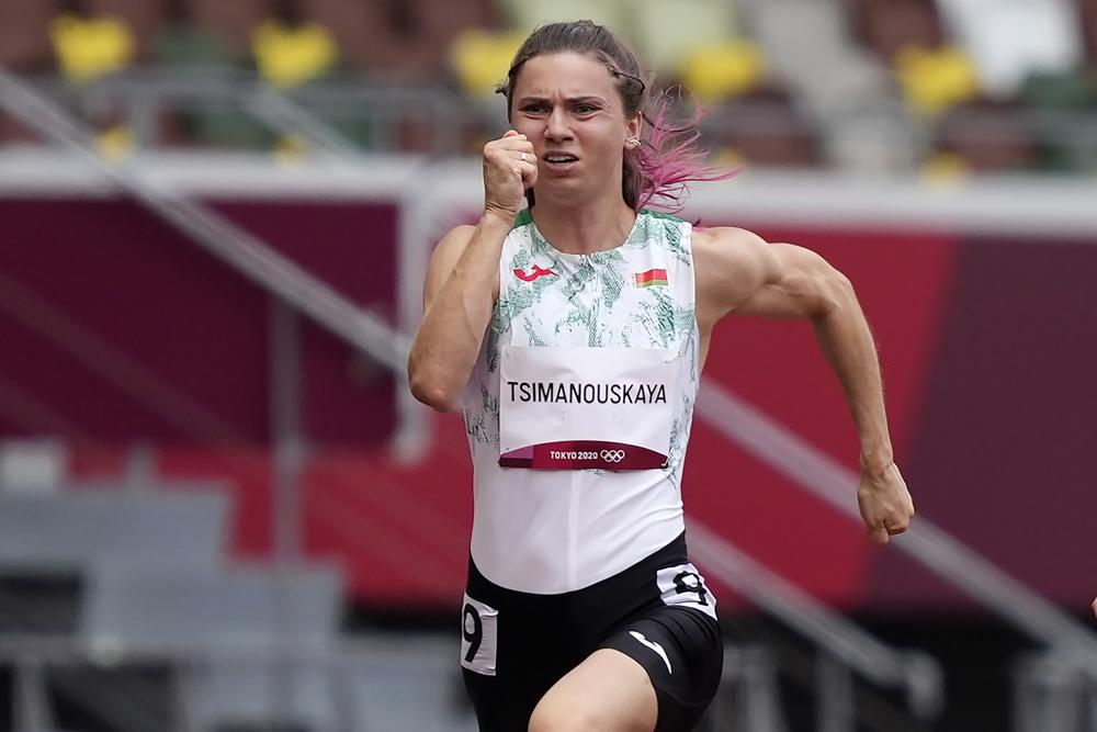 Belarusian sprinter says punishment awaited her back home