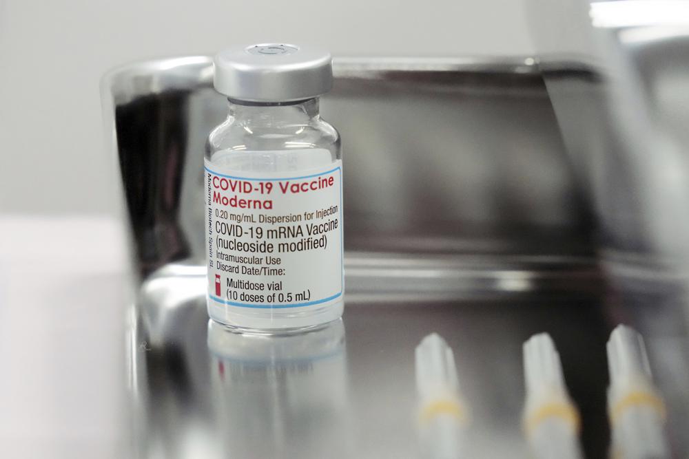 Japan halts some Moderna vaccine after contamination found