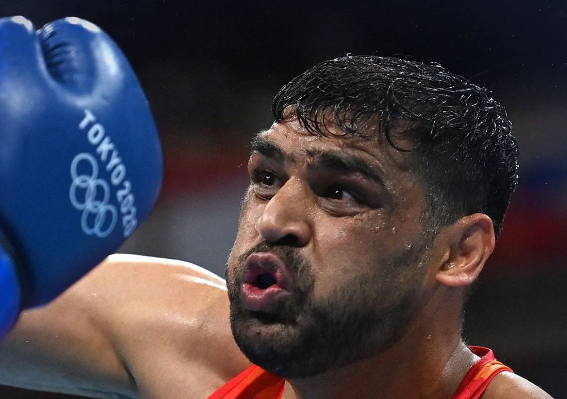 Kumar’s debut Olympics ends with loss to world champ Jalolov in QFs