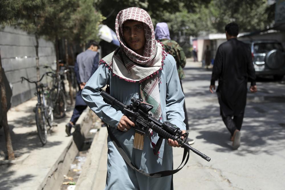 7 killed at Kabul airport; fighters seize areas from Taliban
