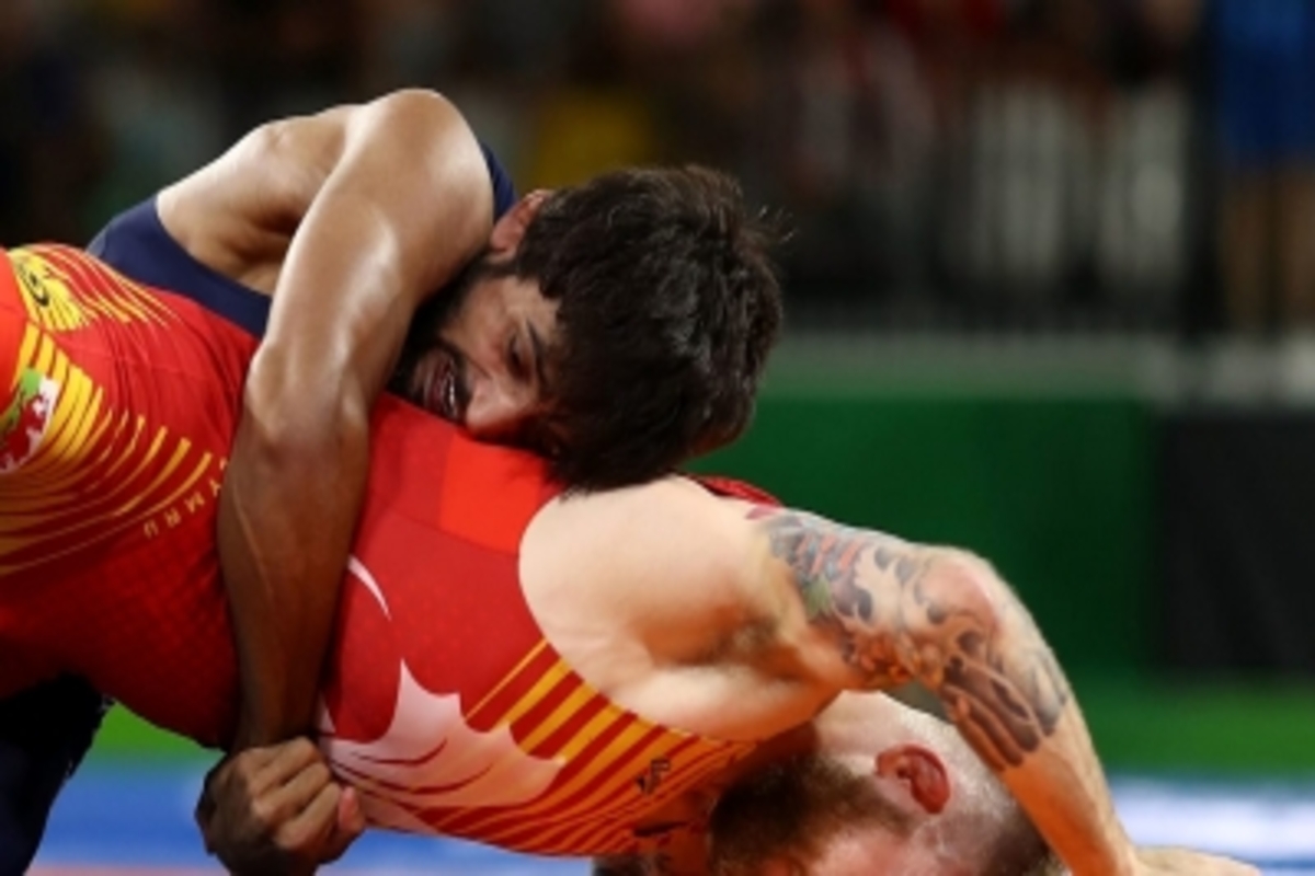For bronze, wrestler Bajrang Punia risked aggravating knee injury
