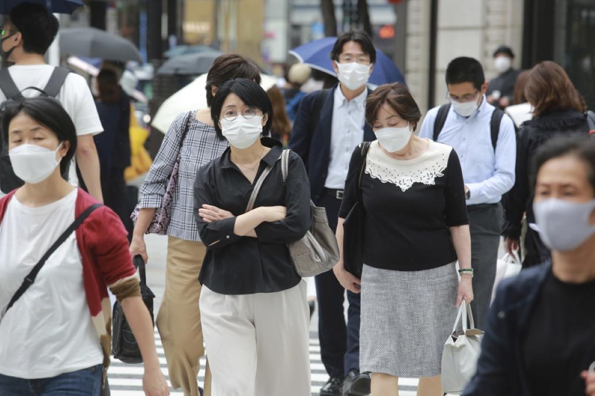 Japan to extend virus emergency until end of month