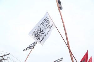 Islamabad police taunted as Jamia Hafsa hoists Taliban flag