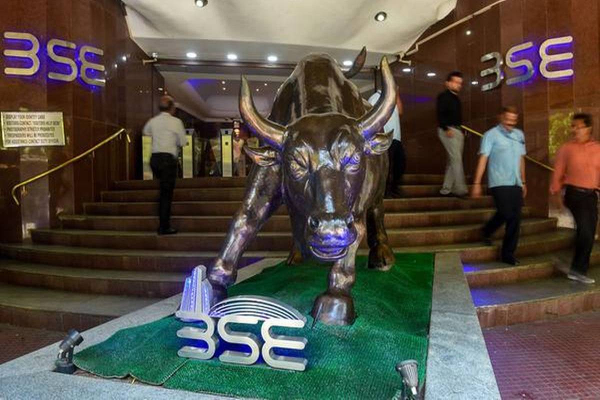 Stock market ends almost flat amid volatile session