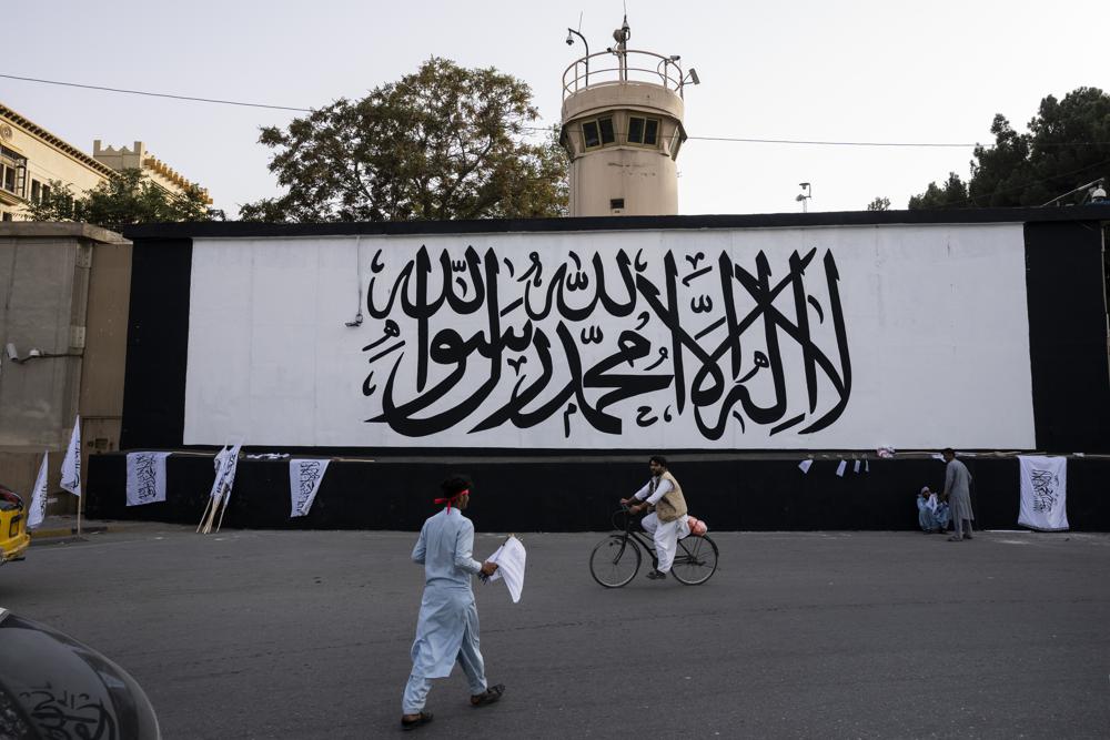 Taliban flag rises over seat of power on fateful anniversary