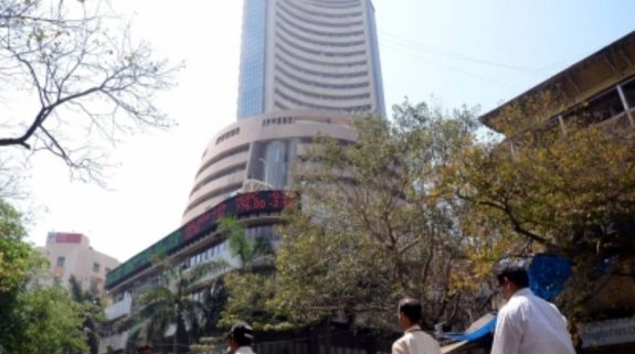 Indices end almost flat amid volatility ahead of US inflation data