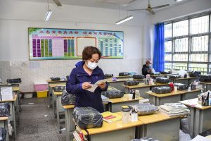 COVID resurges in China, spreading to schools, kindergarten