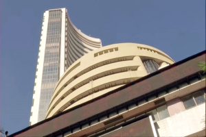 Sensex rebounds 877 points from day’s low; closes 296 points higher