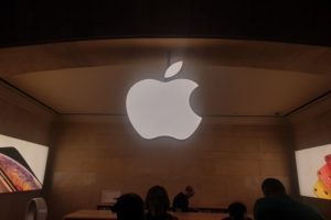 Apple briefly crosses record $3 trillion market cap