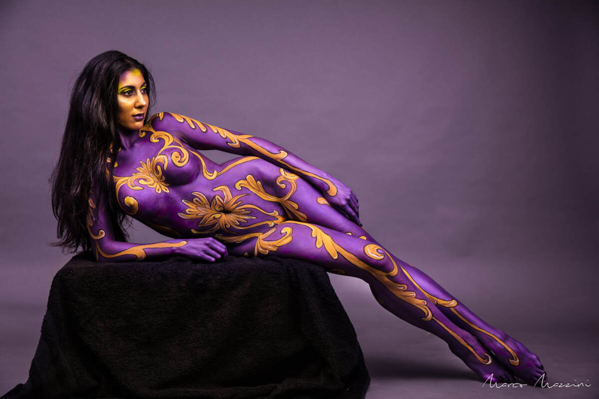 Body painting: Representation of colorful art with bright acrylic colors