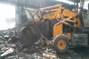 Bulldozers pull down toilet building being used by villager, lands in hospital