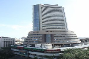Sensex extends losses for third day, drops 128 points