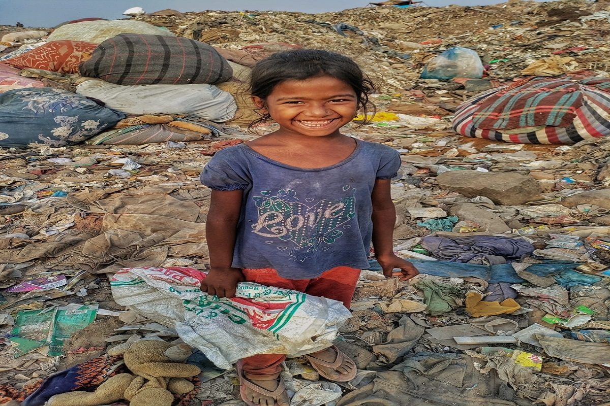 Children growing up in Delhi landfills have little to do but sort out rubbish