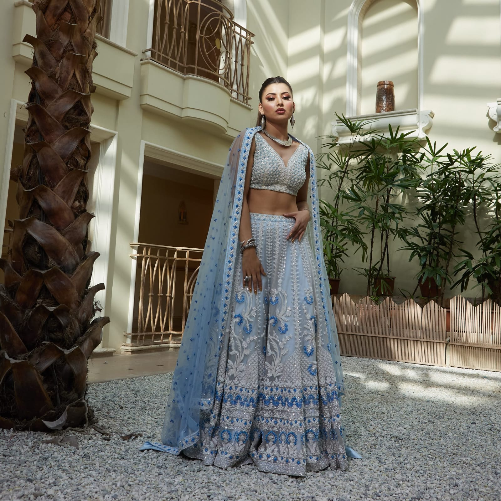 Urvashi looked absolutely beautiful in the shimmery summer lehenga with a mix of pastel hues, the sheer dupatta, and the tassels.