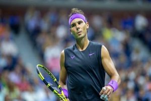 Injured Nadal knocked out of Australian Open