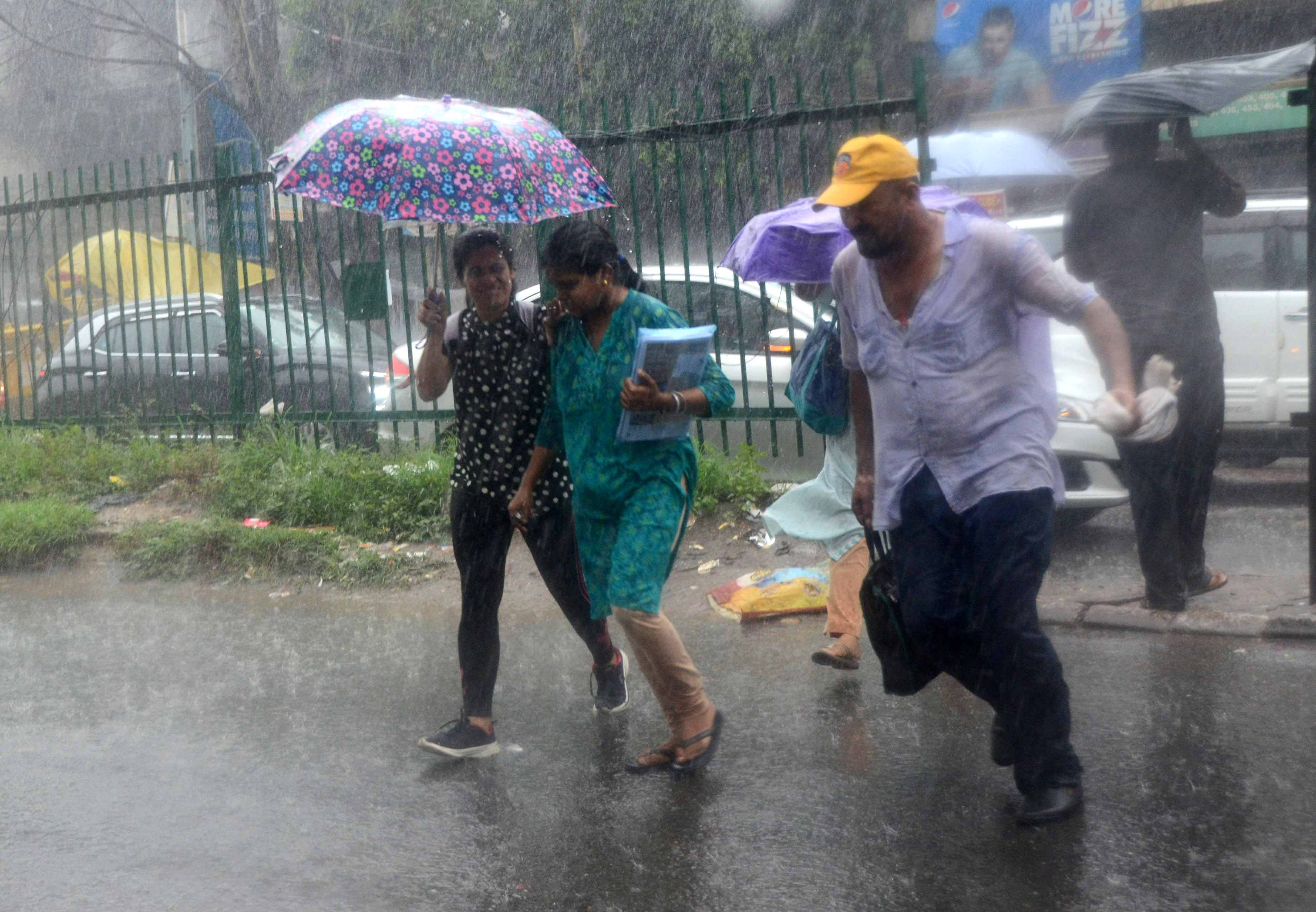 Delhi: Rain lashes several parts of city, brings down mercury
