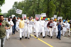 Punjab: AAP protests Guv’s move to cancel assembly session with ‘Shanti March’