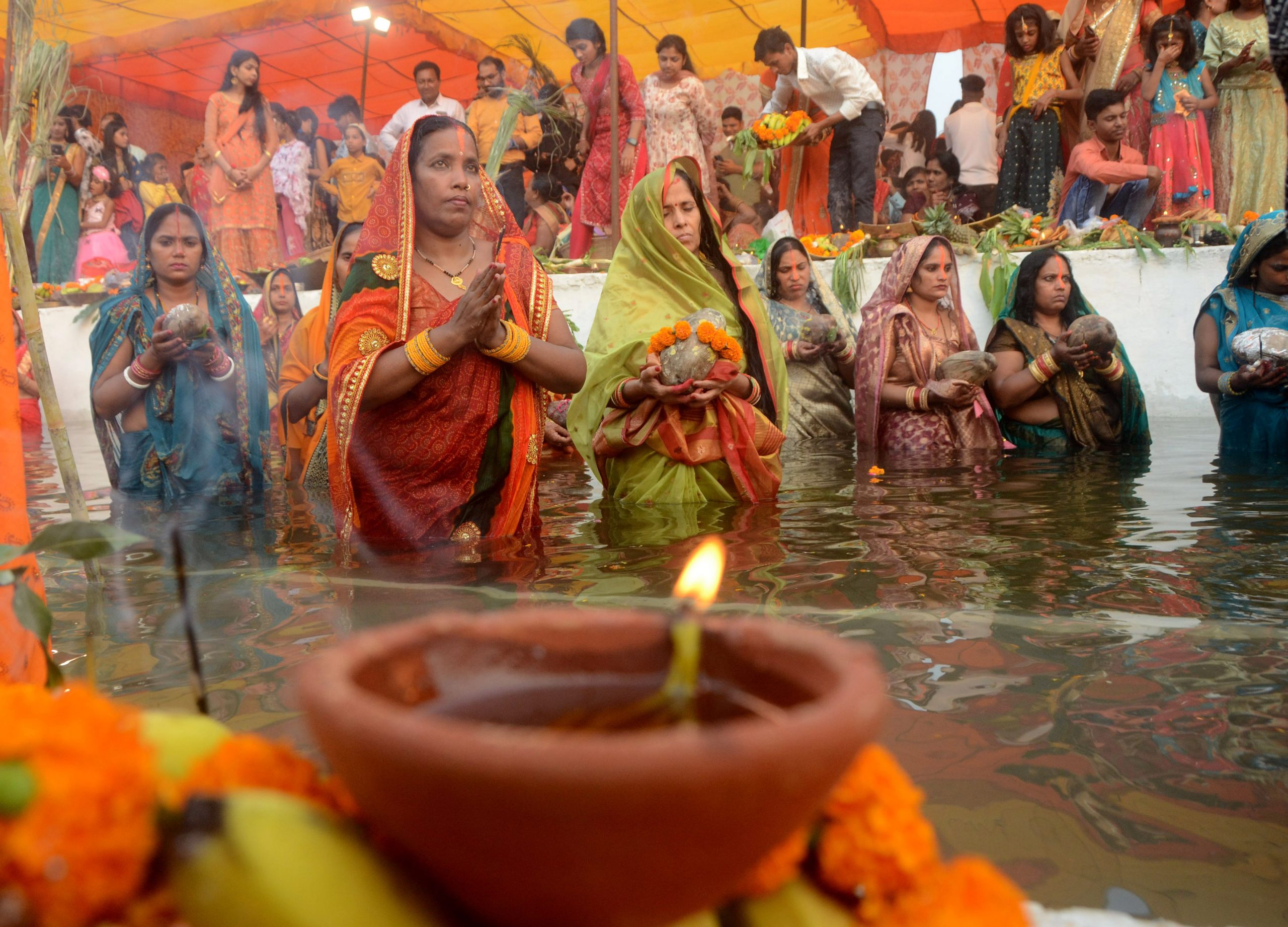 Devotees perform rituals of Chhath Puja festival, at Chhath Ghat,ITO, in the capital (Subrata Dutta)