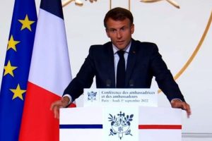 Macron promises solution to high inflation, strikes