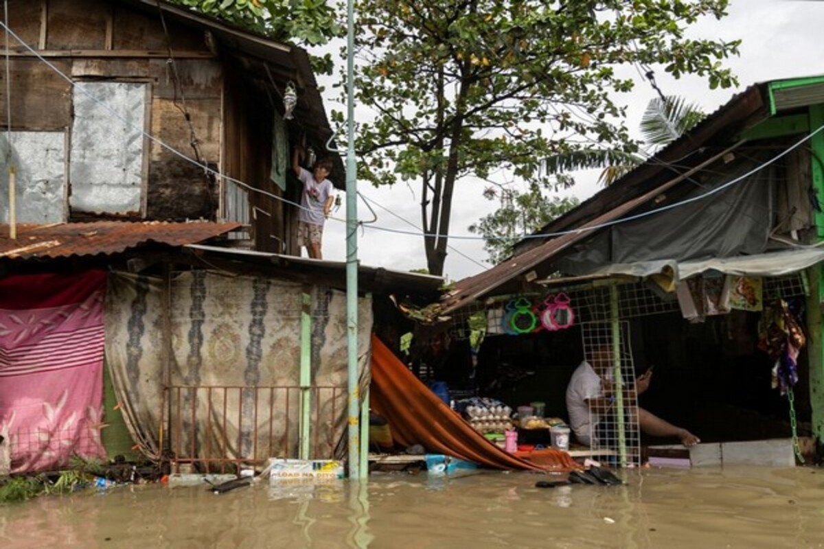 Philippines death toll from Christmas flood, rain rises to 26