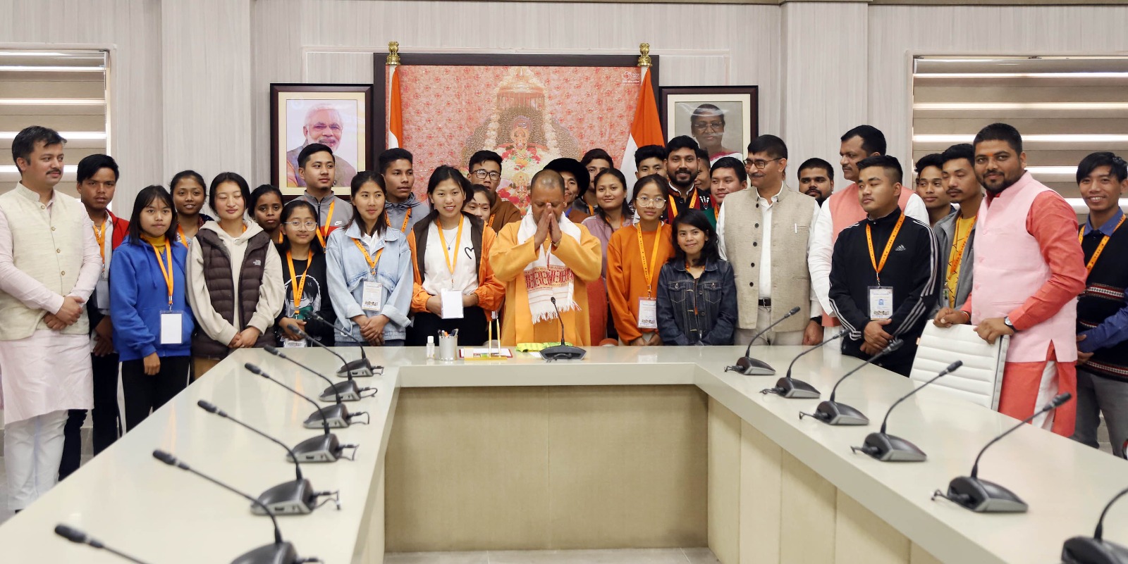 Uttar Pradesh Chief Minister Yogi Adityanath with students from NE at his residence in Lucknow on Wednesday