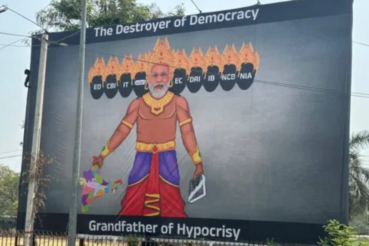 BJYM pulls down BRS poster depicting Modi as Ravana