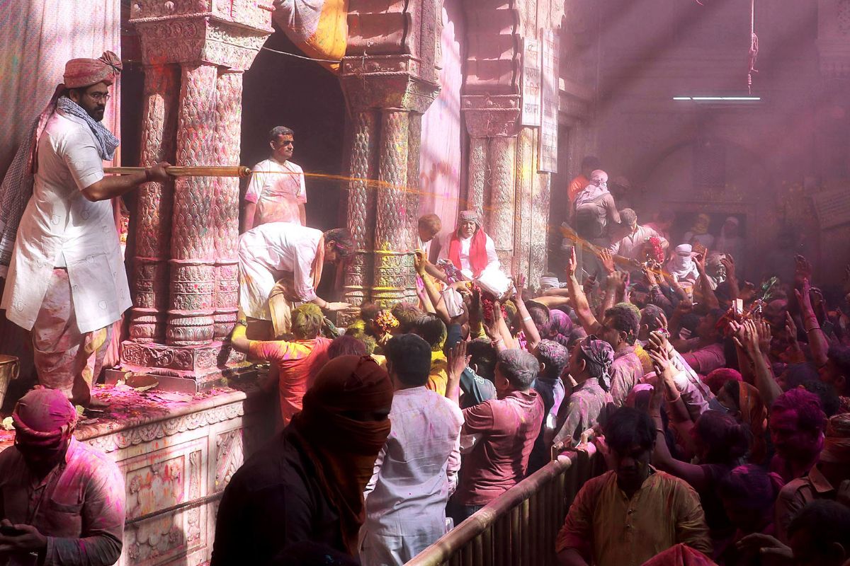 Devotees throng Vrindavan’s Banke Bihari temple to offer prayers on Holi