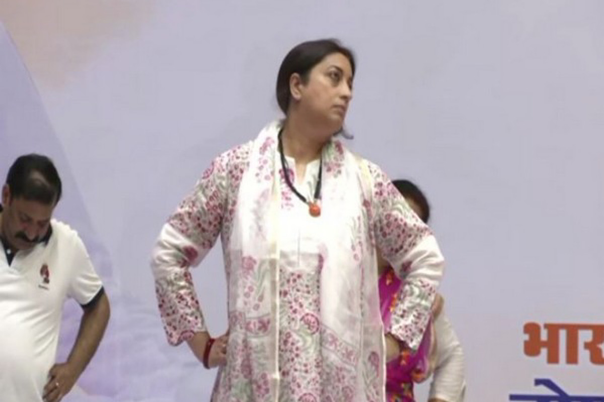 International Yoga Day: Union Minister Smriti Irani performs yoga at Noida indoor stadium in UP