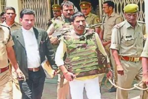 Who is Anil Dujana who was killed in an encounter by UP Police?