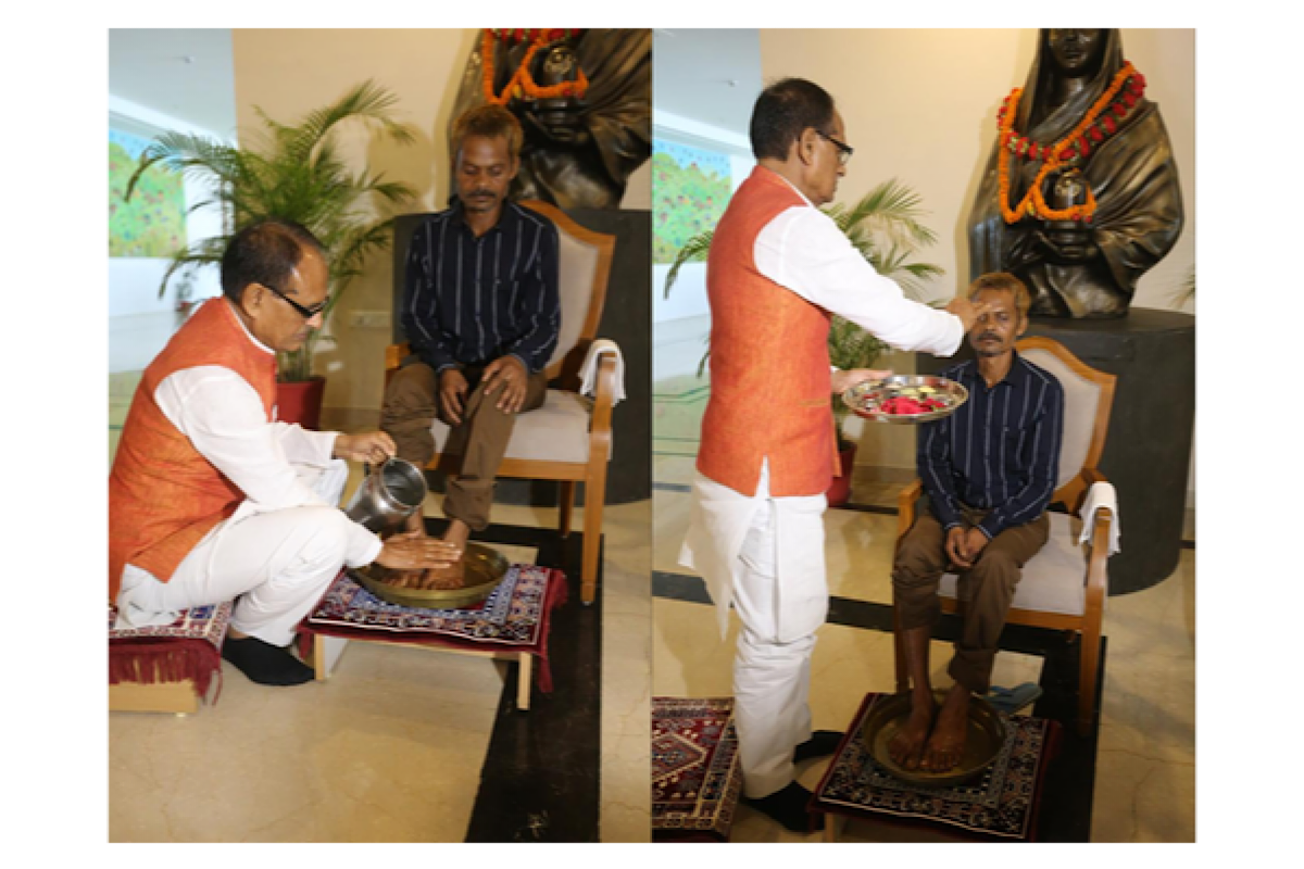 MP CM Shivraj Singh Chouhan washes tribal mans feet who was urinated on