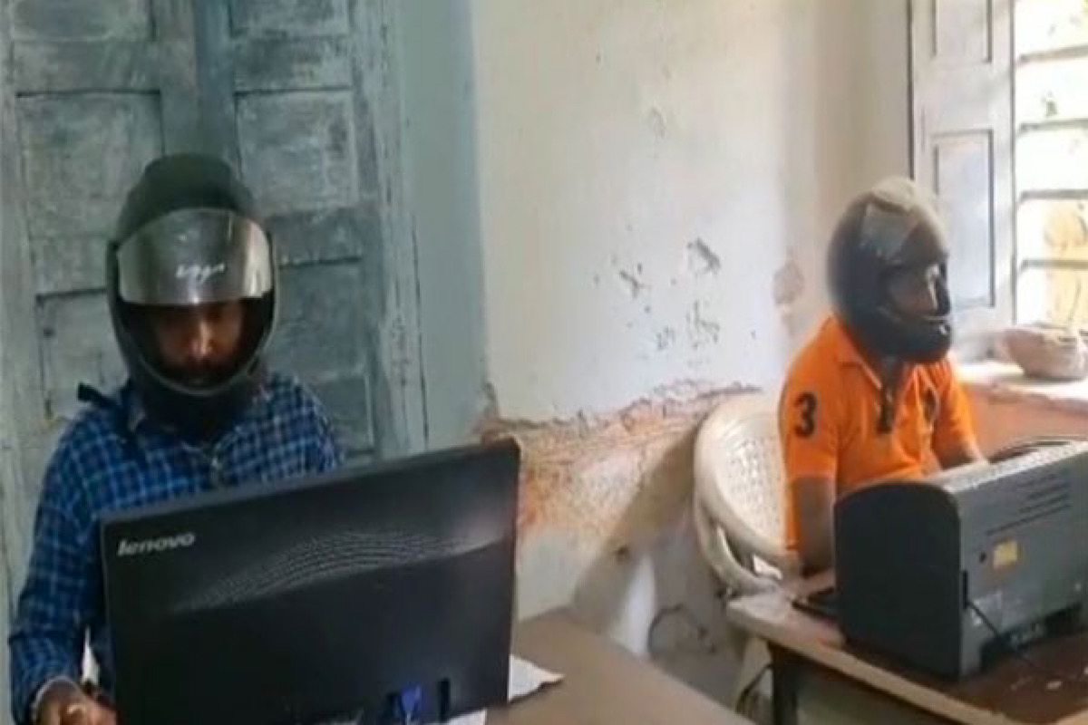 Telangana: Staffers at govt office wear helmets at work, know why