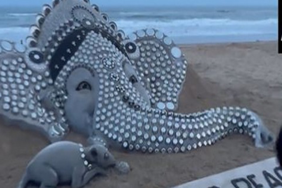 Sand artist Sudarsan Pattnaik sculpts Lord Ganesha on beach ahead of festival
