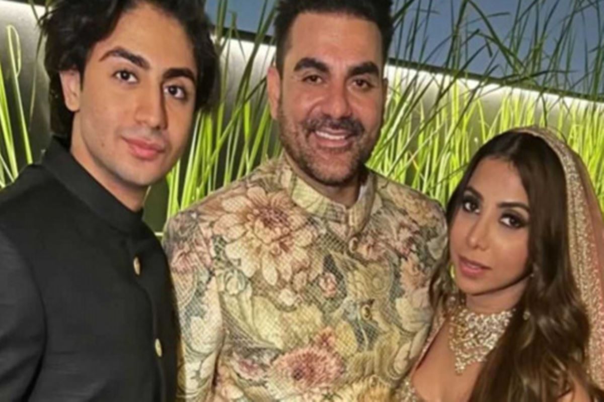 Newlyweds Arbaaz, Sshura pose with son Arhaan at wedding ceremony