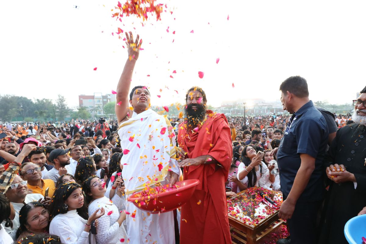 Yoga guru Baba Ramdev leads Holi celebrations at Patanjali Yogpeeth