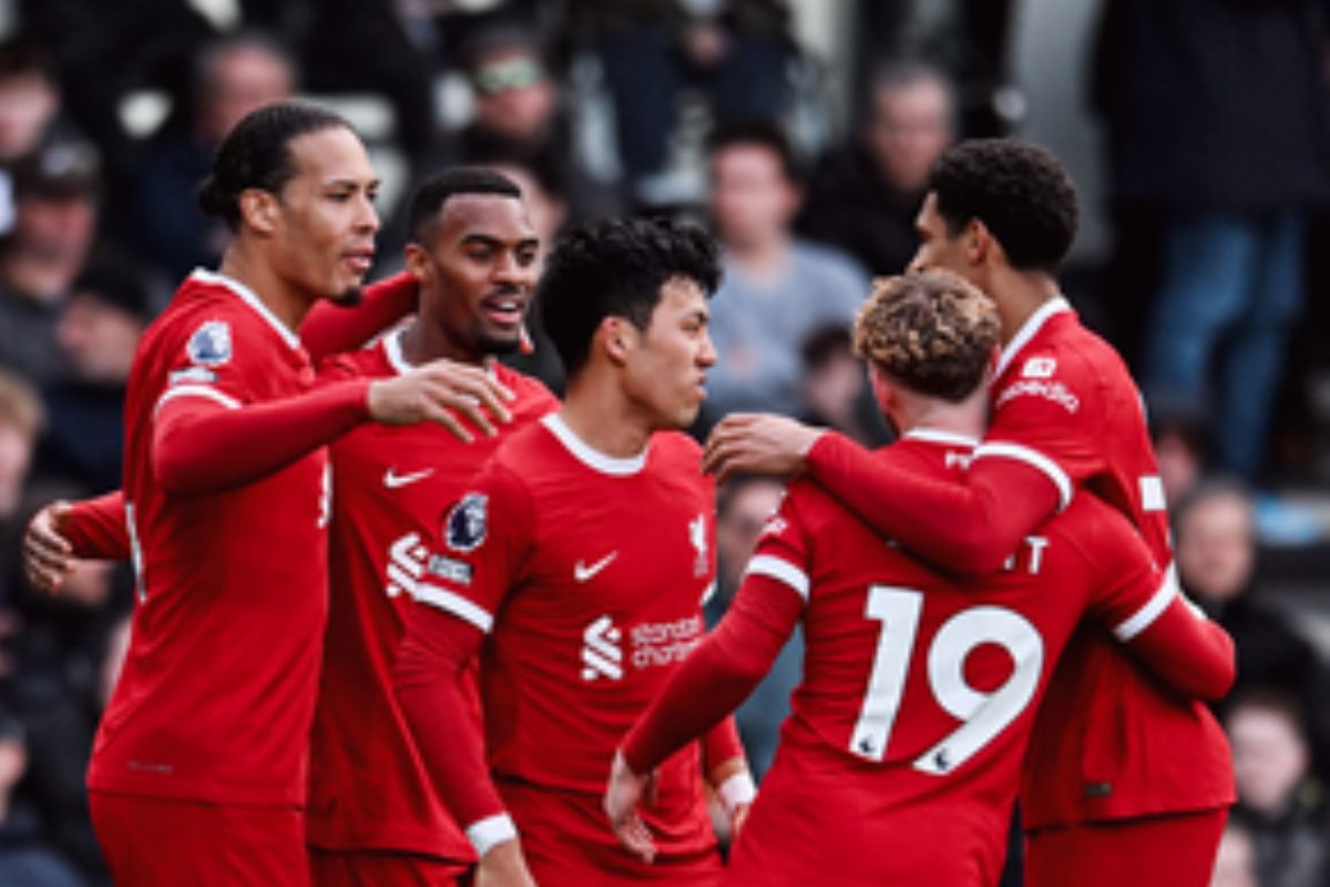 Premier League: Liverpool win at Fulham to go level with leaders Arsenal