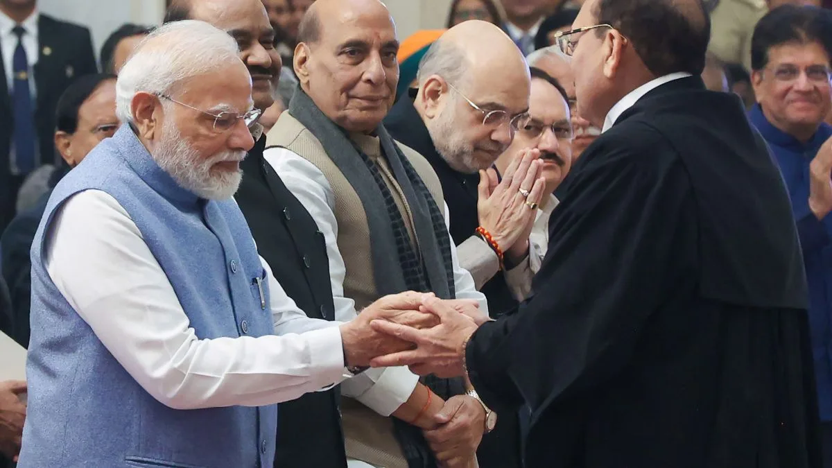 Prime Minister Narendra Modi greets Justice Surya Kant after he is sworn in as Chief Justice of India.