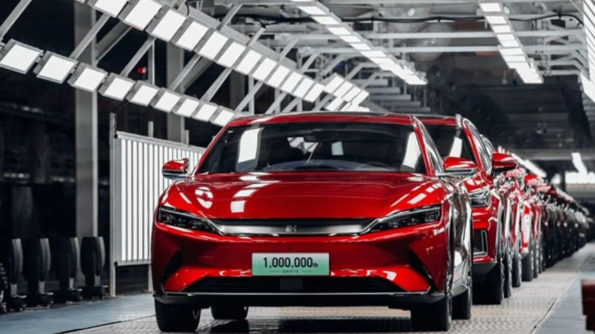 BYD Tesla full year sales 2025, BYD becomes largest EV seller, Tesla sales decline 2025, Chinese EV market growth, BYD electric car deliveries, Tesla production drop,