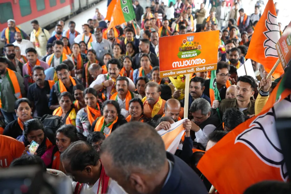 The delegation receives a warm welcome at the station by party workers and supporters celebrating their electoral success. img
