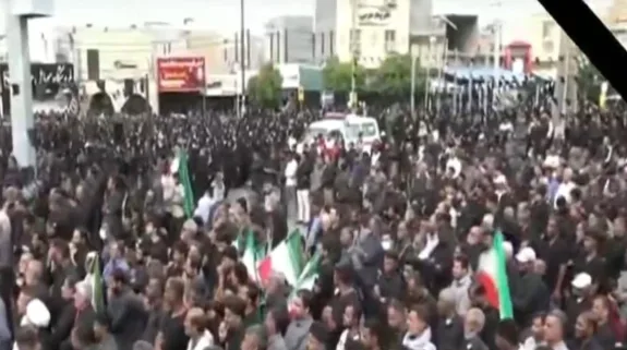 Large crowd gathers in Minab, Iran, during funeral procession for schoolgirls killed in US-Israeli strike