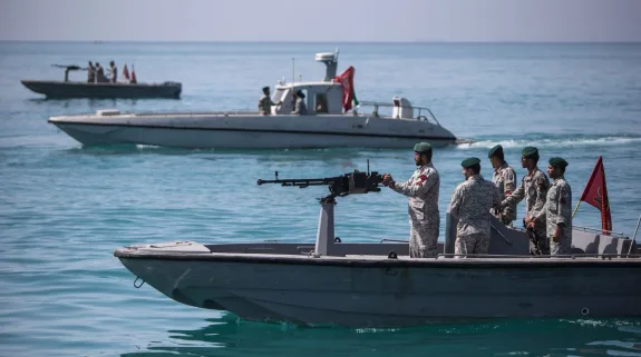 Iranian soldiers patrol the Strait of Hormuz in southern Iran as tensions over shipping security in the Gulf draw global attention.