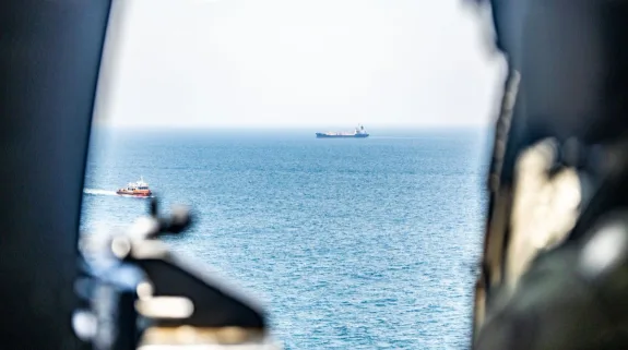 View of vessels in the Strait of Hormuz seen from inside a military aircraft during heightened tensions in the Gulf region