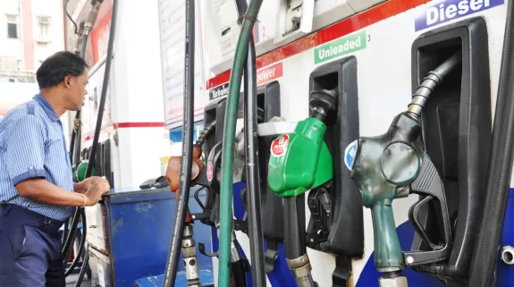 Fuel dispensing nozzles at a petrol station in India